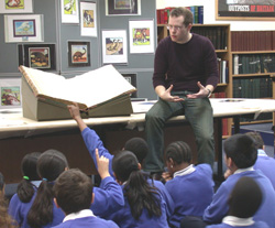 Photograph of a school class on an education visit to The Royal Mail Archive