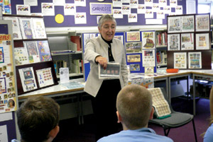 Photograph of Erene Grieve leading a school stamp day